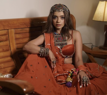Pooja Kalyani Rust Lehenga Set