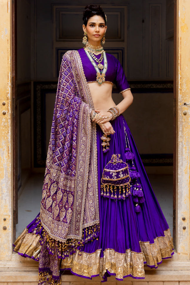 Traditional purple and gold lehenga set lumpi border and heavy dupatta