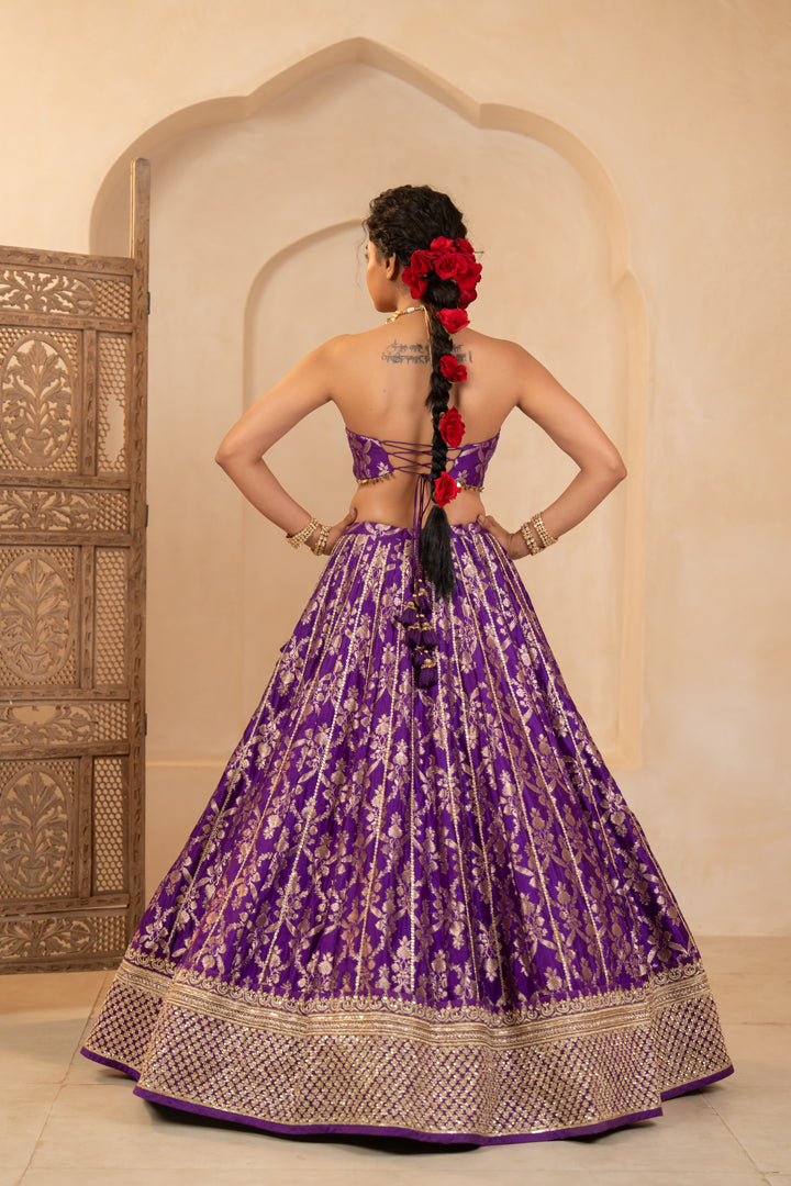 Beautiful purple lehenga set with backless corset blouse 