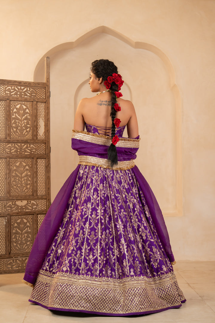 Purple ethnic banarasi weaved lehenga with corset blouse